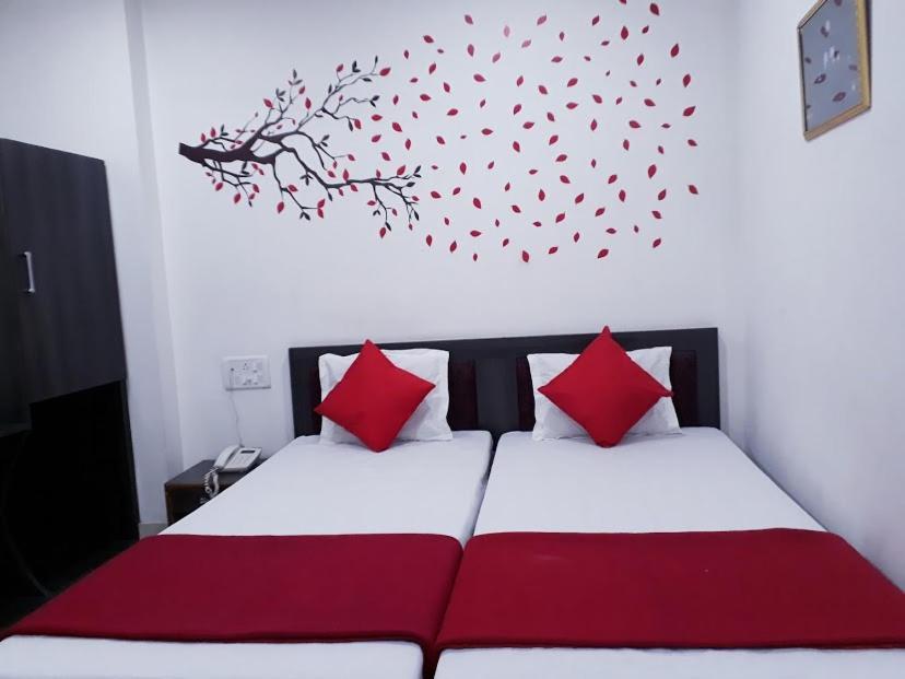 Hotel Executive Inn Hailakandi Pokoj fotografie